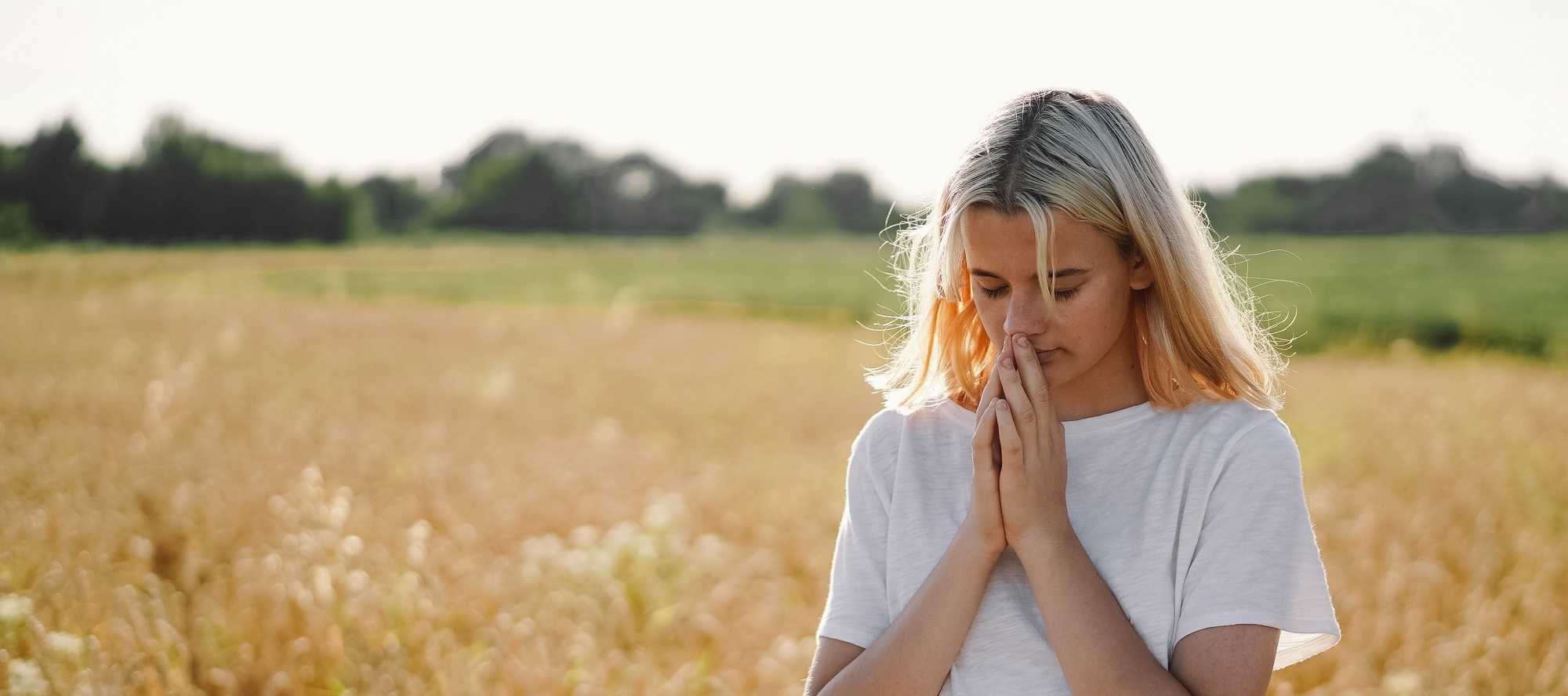 Praying Girl in field